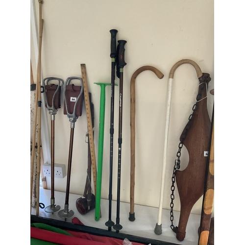 60 - QTY OF SHOOTING STICKS, YOKES, FLAGS, WALKING STICKS ETC