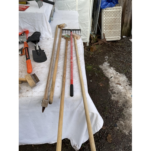 63 - 2 CRATES AND A QTY OF GARDENING ITEMS TO INCLUDE WATERING CANS, SHEARS, LOPERS HOSEPIPE FORKS AND TR... 