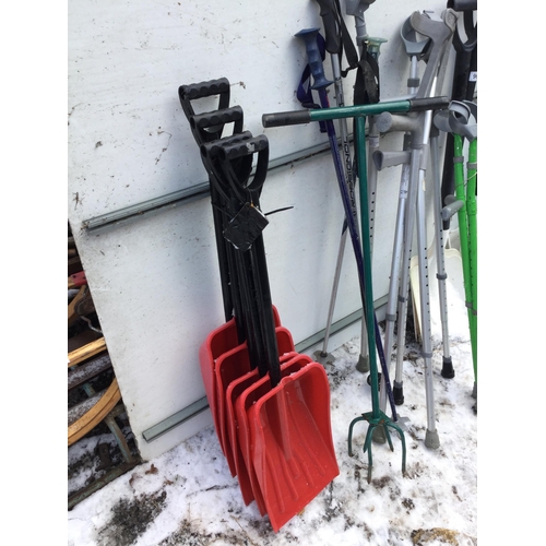 96 - QTY OF SNOW SHOVELS, WALKING STICKS ETC