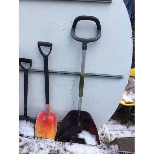 96 - QTY OF SNOW SHOVELS, WALKING STICKS ETC