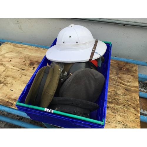 179 - CRATE OF MILITARY HATS AND PITH HELMET