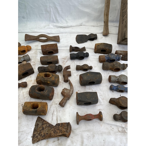 5 - CRATE AND WOODEN BOX OF VINTAGE AXE HEADS AND HAMMER HEADS