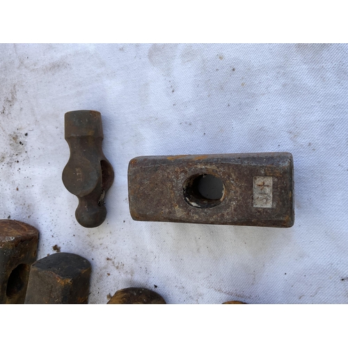 5 - CRATE AND WOODEN BOX OF VINTAGE AXE HEADS AND HAMMER HEADS