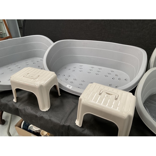 16 - 4 PLASTIC DOG BEDS AND 2 STEP STOOLS