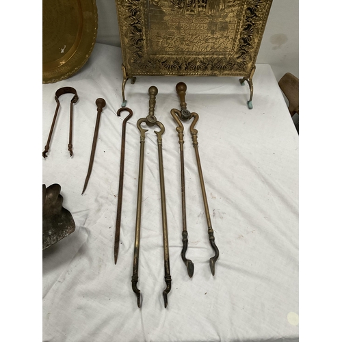 57 - QTY OF BRASSWARE TO INCLUDE FIRE SCREEN, CHARGER, AND FIRE TONGS ETC