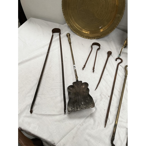 57 - QTY OF BRASSWARE TO INCLUDE FIRE SCREEN, CHARGER, AND FIRE TONGS ETC