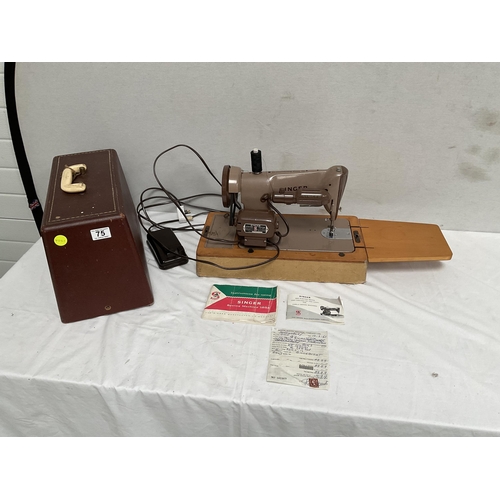 75 - CASED ELECTRIC SINGER SEWING MACHINE WITH INSTRUCTIONS & ACCESSORIES