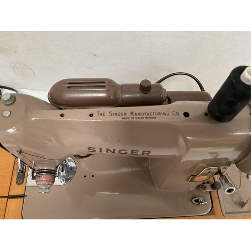 75 - CASED ELECTRIC SINGER SEWING MACHINE WITH INSTRUCTIONS & ACCESSORIES