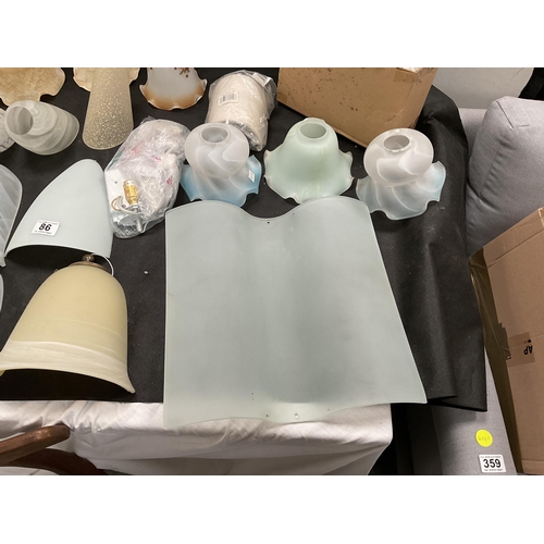 86 - 2 BOXES OF GLASS WALL LIGHT FITTINGS AND SHADES ETC