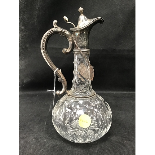 110 - CUT GLASS CLARET JUG WITH SILVER PLATED MOUNTS AND PORT LABEL - H11