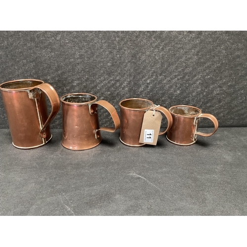 11 - 4 VICTORIAN GRADUATED COPPER TANKARDS
LARGEST H7