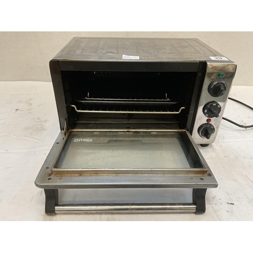 39 - ** WITHDRAWN FAILED TEST **ELECTRIC TABLE TOP OVEN AND GRILL FOOT MISSING