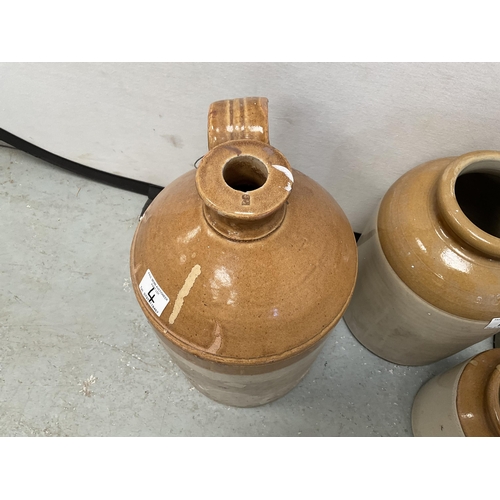 4 - 3 VICTORIAN EARTHENWARE GLAZED JARS AND A FLAGGON H16