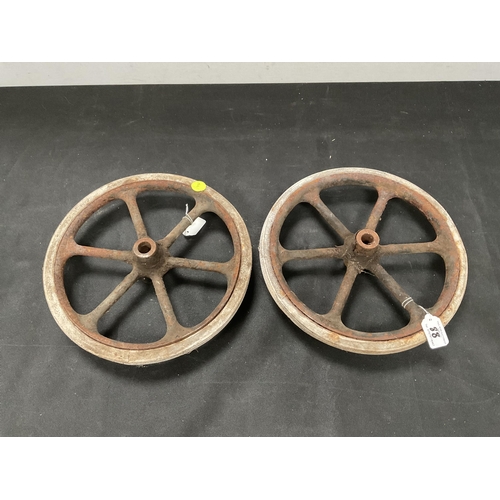 88 - PAIR OF VINTAGE CAST WHEELS WITH RUBBER TYRES DIA 13