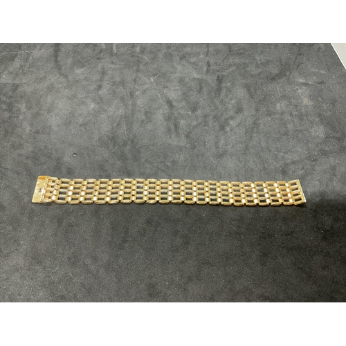 130 - 9CT GOLD 5 BAR FLEXIBLE BRACELET WEIGHT 21G