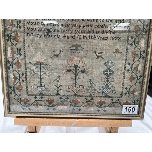 150 - GEORGE IV FRAMED SAMPLER BY MARY HARRIS AGED 13 IN THE YEAR 1823 DEPICTING ADAM AND EVE AND OTHER FL... 