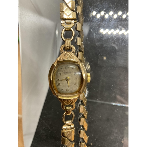 165 - SMALL LADIES 9CT GOLD WRIST WATCH ALONG WITH A QTY OF YELLOW METAL ITEMS