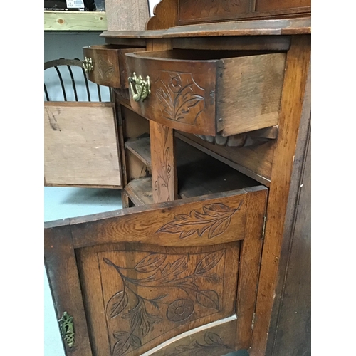 244 - EDWARDIAN OAK MIRROR BACK SIDEBOARD FITTED WITH 2 DRAWERS OVER 2 DOORS WITH CARVED THISTLE AND FLOWE... 