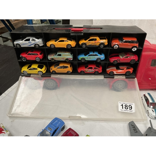 189 - QTY OF DIE CAST TOY CARS AND A PLASTIC TRANSPORTER BOX IN THE SHAPE OF A LORRY