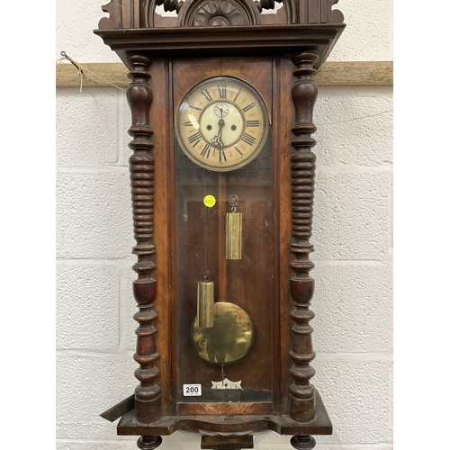 200 - VICTORIAN MAHOGANY CASED TWIN WEIGHT VIENNA WALL CLOCK WITH LION FINIAL A/F