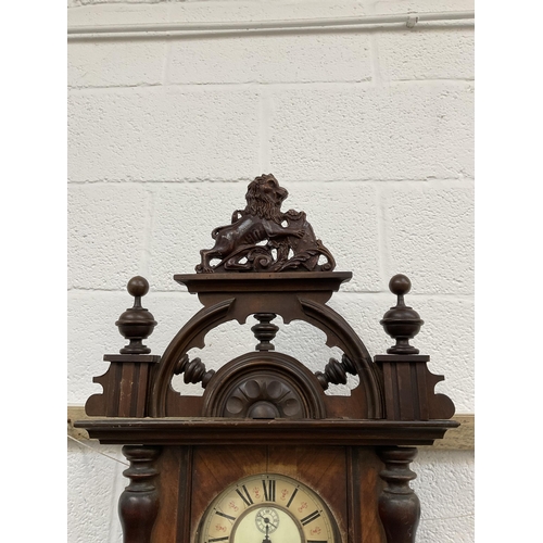 200 - VICTORIAN MAHOGANY CASED TWIN WEIGHT VIENNA WALL CLOCK WITH LION FINIAL A/F