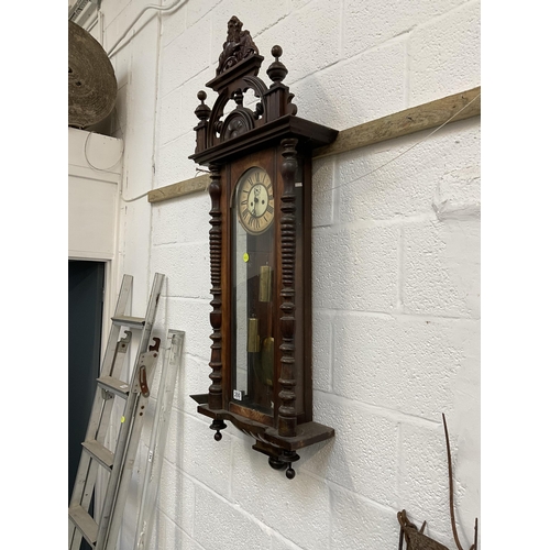 200 - VICTORIAN MAHOGANY CASED TWIN WEIGHT VIENNA WALL CLOCK WITH LION FINIAL A/F