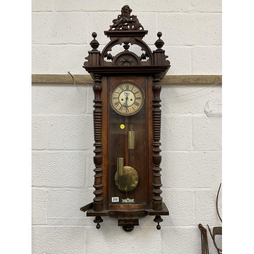 200 - VICTORIAN MAHOGANY CASED TWIN WEIGHT VIENNA WALL CLOCK WITH LION FINIAL A/F