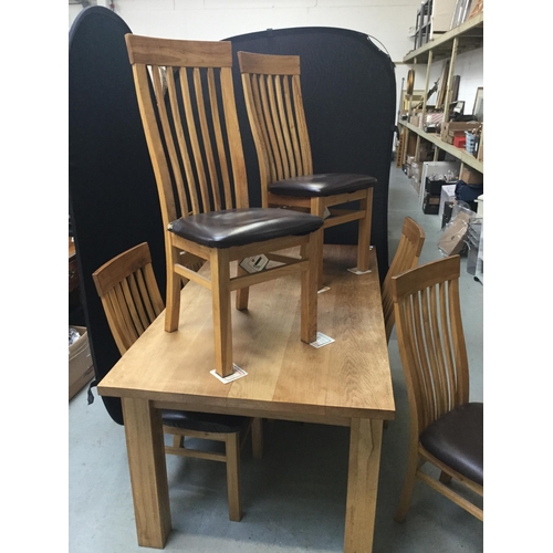 252 - MODERN LIGHT OAK DINING TABLE AND 6 CHAIRS - H31