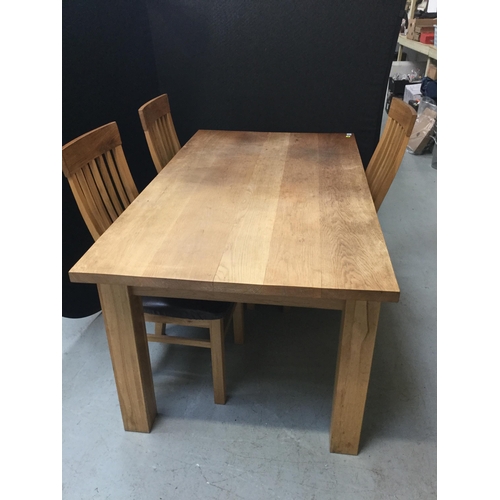 252 - MODERN LIGHT OAK DINING TABLE AND 6 CHAIRS - H31