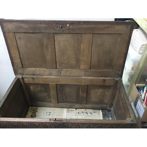 255 - ANTIQUE OAK COFFER WITH 3 PANEL LID AND CARVED FRONT A/F  H25