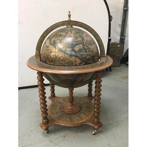 262 - REPRODUCTION FLOOR STANDING GLOBE DRINKS CABINET WITH BARLEY TWIST SUPPORTS STRETCHERED BASE AND BRA... 