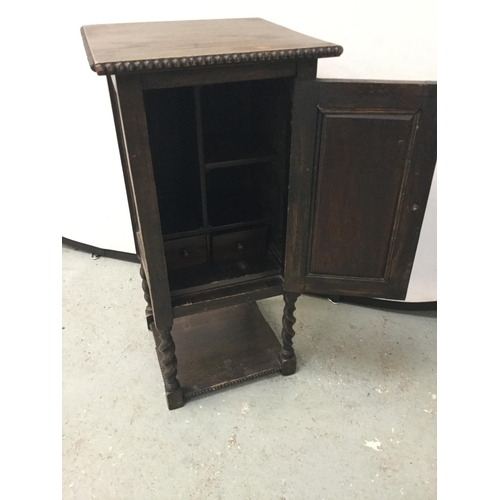 263 - VINTAGE OAK BEDSIDE CABINET WITH FITTED INTERIOR ON BARLEY TWIST LEGS WITH CARVED INITIALS TO THE DO... 