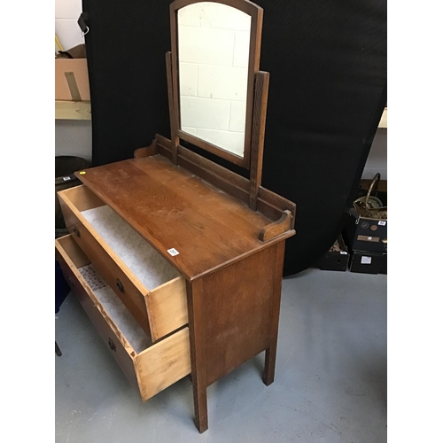 281 - VINTAGE OAK DRESSING TABLE FITTED WITH 2 DRAWERS AND A MIRROR WITH CARVED DECORATION H59