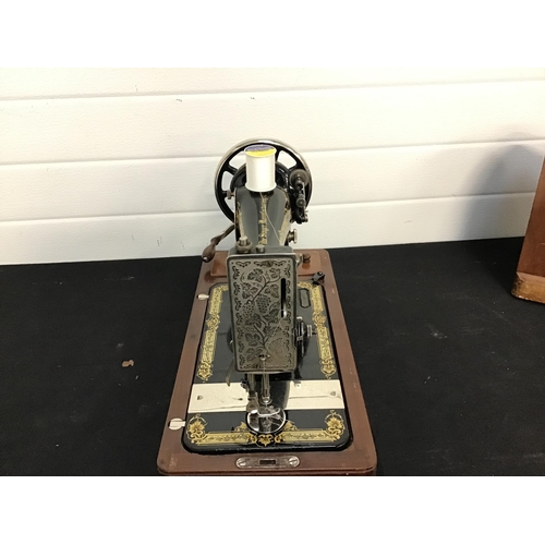 282 - VINTAGE SINGER SEWING MACHINE IN CASE C/W KEY