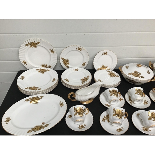 300 - QTY OF ROYAL IMPERIAL GOLD DECORATED DINNERWARE TO INCLUDE 2 VEGETABLE DISHES - 48 PIECES