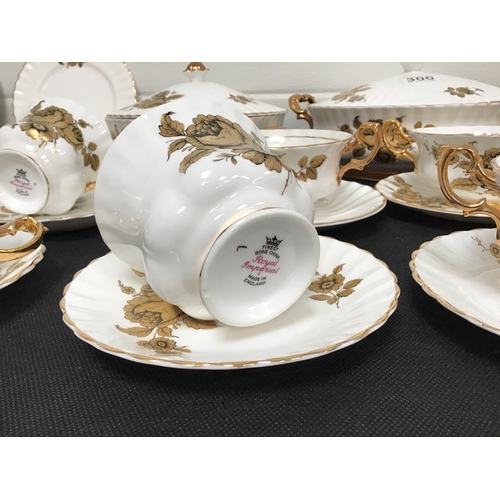 300 - QTY OF ROYAL IMPERIAL GOLD DECORATED DINNERWARE TO INCLUDE 2 VEGETABLE DISHES - 48 PIECES