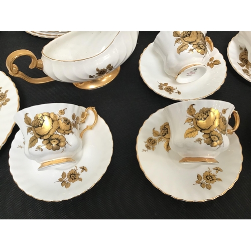 300 - QTY OF ROYAL IMPERIAL GOLD DECORATED DINNERWARE TO INCLUDE 2 VEGETABLE DISHES - 48 PIECES