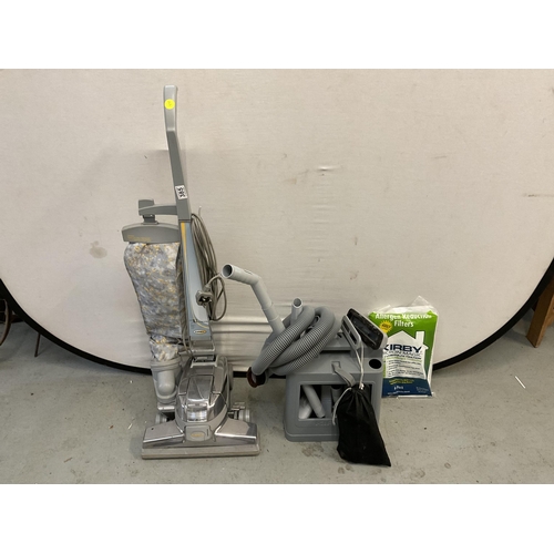 385 - KIRBY VACUUM CLEANER AND ACCESSORIES TO INCLUDE 20 YEARS SERVICE HISTORY