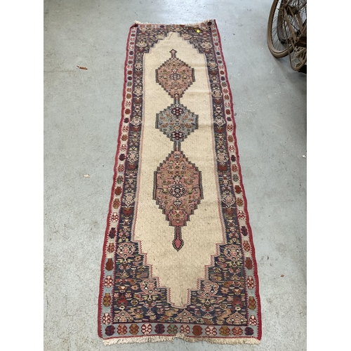 387 - 3 VINTAGE HAND MADE WOOLEN RUGS
61