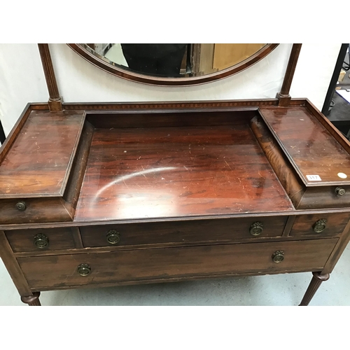 317 - EDWARDIAN MAHOGANY DRESSING TABLE FITTED WITH 6 DRAWERS ON FLUTED LEGS WITH OVAL MIRROR ABOVE H64