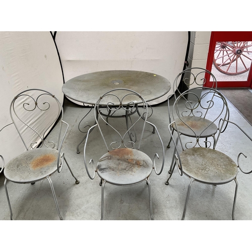 406 - METAL PAINTED GARDEN/PATIO TABLE AND 4 CHAIRS WITH DECORATIVE BACKS A/F