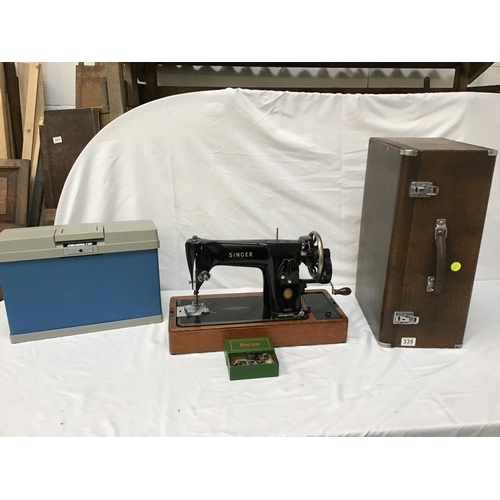 335 - TABLE TOP SINGER SEWING MACHINE CASED AND A BOX FILE