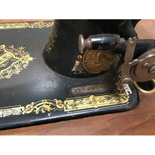 341 - VINTAGE TREADLE SINGER SEWING MACHINE WITH CAST IRON BASE AND FITTED DRAWERS