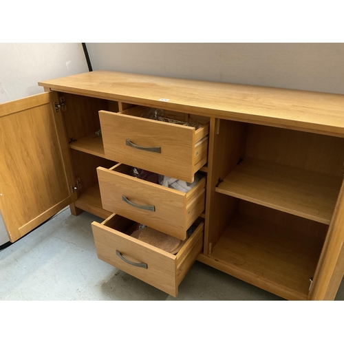 426 - MODERN LIGHT OAK SIDEBOARD FITTED WITH 2 CUPBOARDS AND 3 DRAWERS H34