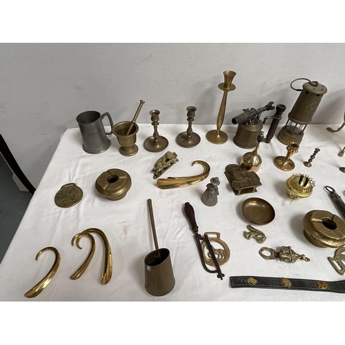 52 - BOX OF BRASSWARE TO INCLUDE CANDELSTICKS BLOW LAMPS JARDINERE ETC