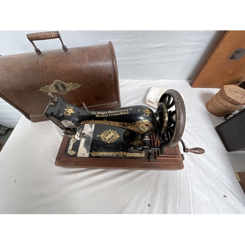 61 - CASED SINGER SEWING MACHINE