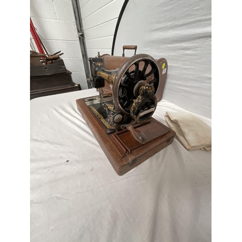 61 - CASED SINGER SEWING MACHINE