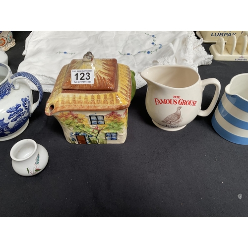 123 - BOX OF CHINA TO INCLUDE TEAPOTS , TOAST RACK ETC