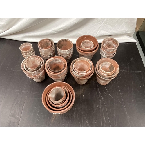 214 - CRATE OF VINTAGE TERRACOTTA PLANT POTS