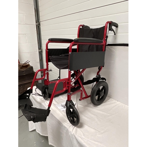 216 - LIGHTWEIGHT SELF PROPELLED FOLDING WHEELCHAIR C/W SEAT PAD AND FOOTREST